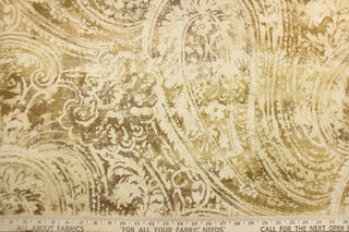 This fabric features a paisley design in brown tones with hints of green .