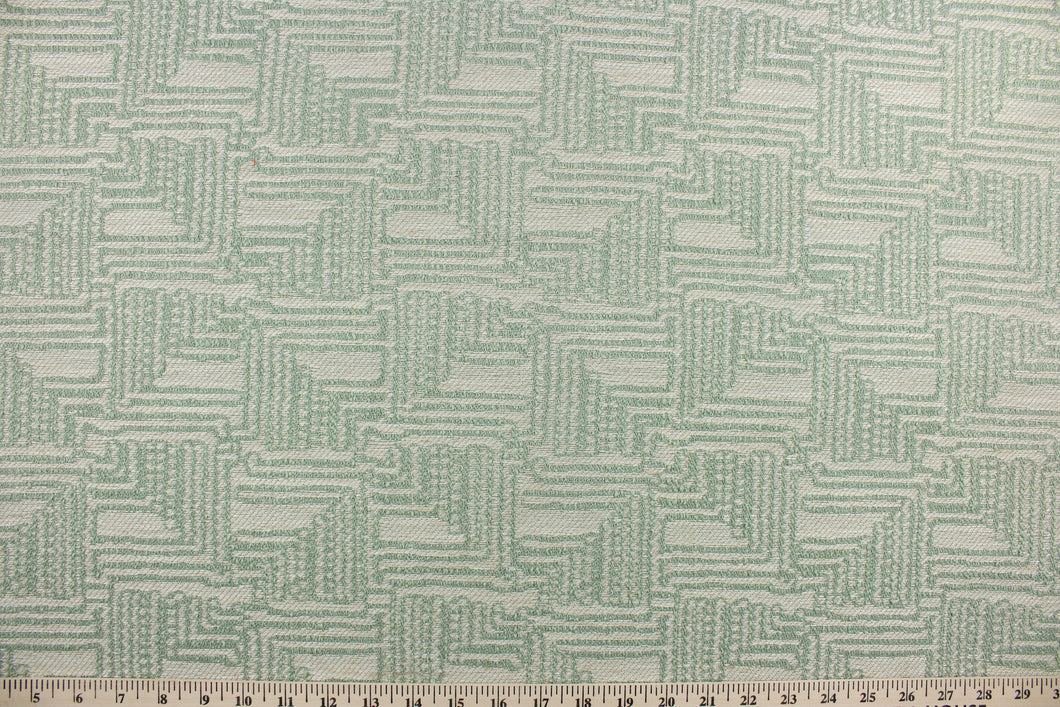  Infinity is a multi use jacquard fabric featuring a diamond maize design in juniper green and pearl.  It is durable with 51,000 double rubs and would be great for upholstery, bedding, cornice boards, accent pillows and window treatments.