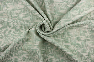  Infinity is a multi use jacquard fabric featuring a diamond maize design in juniper green and pearl.  It is durable with 51,000 double rubs and would be great for upholstery, bedding, cornice boards, accent pillows and window treatments.