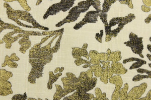 This fabric features a metallic threaded floral design in gold and black. 