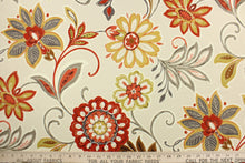Load image into Gallery viewer, This fabric features a floral design in mustard, orange, taupe, gray, cream, black, beige, and brown.
