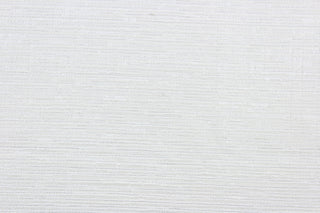 Halo is a woven and textured multi use jacquard fabric in winter white with silver metallic highlights. It is durable and would be great for upholstery, bedding, cornice boards, accent pillows and window treatments.