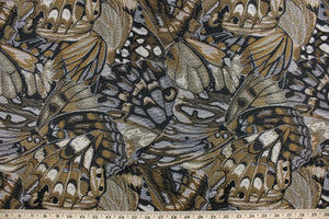 This tapestry fabric features a unique pattern design in the colors of copper, silver, gold, black and beige.  The intricate pattern won’t fade with uses making it great for upholstery projects and more.  The fabric is durable and strong with 15,000 double rubs.  It would compliment any room whether you use it for drapery or throw pillows. It is also perfect for upholstery, home décor, duvet covers and apparel.  