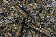 Load image into Gallery viewer, This tapestry fabric features a unique pattern design in the colors of copper, silver, gold, black and beige.  The intricate pattern won’t fade with uses making it great for upholstery projects and more.  The fabric is durable and strong with 15,000 double rubs.  It would compliment any room whether you use it for drapery or throw pillows. It is also perfect for upholstery, home décor, duvet covers and apparel.  
