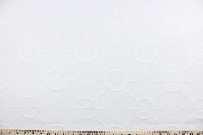 Ships Wheel matelassé fabric in chalk white features a captain's wheel design.  It is durable with 15,000 double rubs and would be great for upholstery, bedding, cornice boards, accent pillows and window treatments.