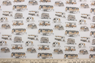 This Solarium outdoor decorative print features campers in various sizes.  Colors include shades of brown, black and off-white.  This versatile, long-lasting fabric can withstand up to 500 hours of sunlight, water and stain resistant and has 10,000 double rubs.  It is perfect for lounge cushions, pool furniture, tablecloths, decorative pillows and upholstery projects.  This fabric has a slightly stiff feel but is easy to work with.  