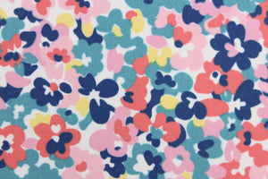 This Solarium outdoor decorative print features a floral design in pink, blue, turquoise, yellow and red on a white background.  This versatile, long-lasting fabric can withstand up to 500 hours of sunlight, water and stain resistant and has 10,000 double rubs.  It is perfect for lounge cushions, pool furniture, tablecloths, decorative pillows and upholstery projects.  This fabric has a slightly stiff feel but is easy to work with.  