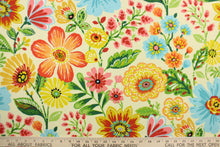 Load image into Gallery viewer, This Solarium outdoor decorative print features a large floral theme in beige, red, pink, blue, mustard, white, green and orange.  This versatile, long-lasting fabric can withstand up to 500 hours of sunlight, water and stain resistant and has 10,000 double rubs.  It is perfect for lounge cushions, pool furniture, tablecloths, decorative pillows and upholstery projects.  This fabric has a slightly stiff feel but is easy to work with.  
