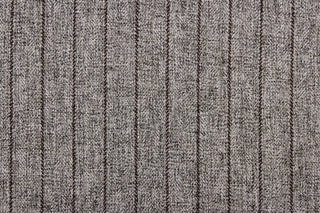  This multi purpose fabric is a neutral dark grey faux wool with a brown stripe.  It offers beautiful design, style and color to any space in your home.  It has a soft workable feel and is durable with 50,000 double rubs.  Perfect for window treatments (draperies, valances, curtains, and swags), upholstery, cornice boards, accent pillows and home décor.