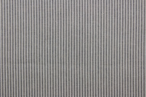This multi purpose fabric features a pin stripe design in dove.  It offers beautiful design, style and color to any space in your home.  It has a soft workable feel and is durable with 51,000 double rubs and has a soil and stain resistant finish.  Perfect for window treatments (draperies, valances, curtains, and swags), upholstery, cornice boards, accent pillows and home décor.