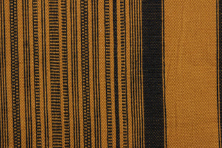 This multi purpose woven fabric features a multi width stripe design in golden brown and black.  It offers beautiful design, style and color to any space in your home.  It has a slightly stiff feel but is workable and durable.  Perfect for window treatments (draperies, valances, curtains, and swags), upholstery, cornice boards, accent pillows and home décor.