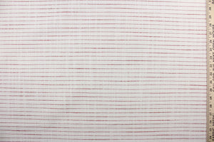 This multi purpose fabric features a woven half inch red stripe against an off white background.  It offers beautiful design, style and color to any space in your home.  It has a soft workable feel and is durable with 51,000 double rubs and has a soil and stain resistant finish.  Perfect for window treatments (draperies, valances, curtains, and swags), upholstery, cornice boards, accent pillows and home décor.