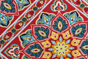  This Solarium outdoor decorative print features a kaleidoscopic design in the colors of blue, red, yellow, mustard, black and white.  This versatile, long-lasting fabric can withstand up to 500 hours of sunlight, water and stain resistant and has 10,000 double rubs.  It is perfect for lounge cushions, pool furniture, tablecloths, decorative pillows and upholstery projects.  This fabric has a slightly stiff feel but is easy to work with.  