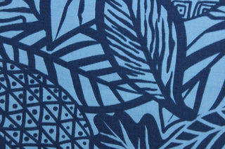 This Solarium outdoor decorative print features large tropical leaves in duo-tone blue.  This versatile, long-lasting fabric can withstand up to 500 hours of sunlight, water and stain resistant and has 10,000 double rubs.  It is perfect for lounge cushions, pool furniture, tablecloths, decorative pillows and upholstery projects.  This fabric has a slightly stiff feel but is easy to work with.  