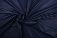 Load image into Gallery viewer, This beautiful solid navy blue fabric has a smooth and lustrous appearance.  The fabric offers a crisp hand and a stiff but flexible drape.  The glossy finish makes it great for apparel, drapery lining and much more.   
