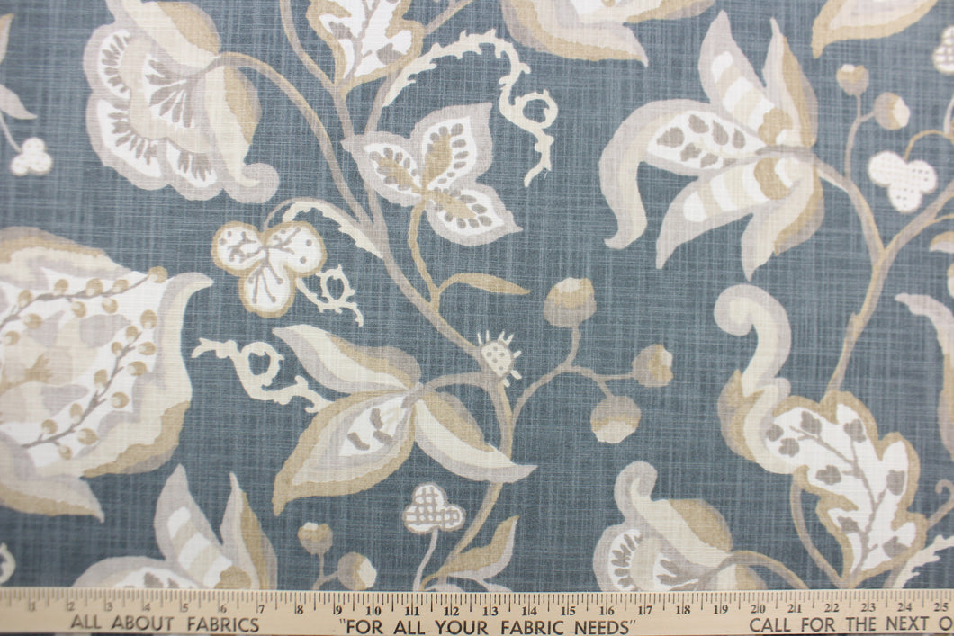 This beautiful design features a gorgeous floral vine print in taupe, tan and white on a slate background.  Use this 100% cotton fabric for clothing as well as drapery, pillows and light upholstery. Add this eye catching fabric to any design. 