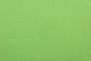 This beautiful solid apple green fabric has a smooth and lustrous appearance.  The fabric offers a crisp hand and a stiff but flexible drape.  The glossy finish makes it great for apparel, drapery lining and much more.   