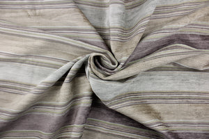 Portofino is a striped, woven upholstery weight fabric in amethyst, light green, light blue and pearl.  It is great for upholstery projects including sofas, chairs, dining chairs, pillows, handbags and craft projects.  It is soft and durable and would make a great accent to any room.  