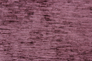 Driftwood is crafted from a luxurious chenille fabric with a ribbed texture in a stunning mulberry hue.  The soft, textured look adds an inviting touch to any room.  This high end upholstery weight fabric is suited for uses that requires a more hard wearing fabric.  It is great for upholstery projects including sofas, chairs, dining chairs, pillows, handbags and craft projects.   