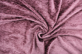 Driftwood is crafted from a luxurious chenille fabric with a ribbed texture in a stunning mulberry hue.  The soft, textured look adds an inviting touch to any room.  This high end upholstery weight fabric is suited for uses that requires a more hard wearing fabric.  It is great for upholstery projects including sofas, chairs, dining chairs, pillows, handbags and craft projects.   