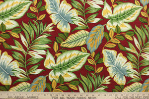 This Solarium outdoor print features a large tropical leaf design in blue, yellow, white and green on a berry red background.  This versatile, long-lasting fabric can withstand up to 500 hours of sunlight, water and stain resistant and has 10,000 double rubs.  It is perfect for lounge cushions, pool furniture, tablecloths, decorative pillows and upholstery projects.  This fabric has a slightly stiff feel but is easy to work with.  