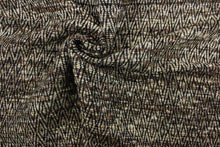 Load image into Gallery viewer, Tangier is a chenille high end upholstery weight fabric that contains thick and soft yarns to create a durable fabric.  Featuring a geometric, diamond, tribal design in brown, beige and black, it would be great for upholstery projects including sofas, chairs, dining chairs, pillows, throws, handbags and craft projects.  
