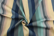 Load image into Gallery viewer, This Solarium outdoor decorative print features a striped design in shades of blue, green, gray and cream.  This versatile, long-lasting fabric can withstand up to 500 hours of sunlight, water and stain resistant and has 10,000 double rubs.  It is perfect for lounge cushions, pool furniture, tablecloths, decorative pillows and upholstery projects.  This fabric has a slightly stiff feel but is easy to work with.  
