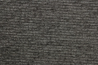  Moraine is a walnut colored chenille high end upholstery weight fabric that is suited for uses that requires a more durable fabric.  The reinforced backing makes it great for upholstery projects including sofas, chairs, dining chairs, pillows, handbags and craft projects.  It is soft and pliable and would make a great accent to any room.  