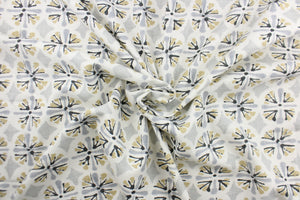  Amelie features an ethnic print in the colors of brown, gray, black and white.  Use this multi purpose fabric for clothing as well as drapery, pillows, bedding, placemats and light upholstery.  