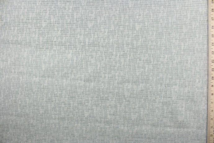  Dorset is a pale blue green chenille high end upholstery weight fabric that is suited for uses that requires a more durable fabric.  The reinforced backing makes it great for upholstery projects including sofas, chairs, dining chairs, pillows, handbags and craft projects.  It is soft and sturdy with 51,000 durable rubs and would make a great accent to any room.  