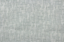 Load image into Gallery viewer,  Dorset is a pale blue green chenille high end upholstery weight fabric that is suited for uses that requires a more durable fabric.  The reinforced backing makes it great for upholstery projects including sofas, chairs, dining chairs, pillows, handbags and craft projects.  It is soft and sturdy with 51,000 durable rubs and would make a great accent to any room.  
