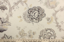 Load image into Gallery viewer, Winslow is a beautiful floral watercolor print in taupe and tan.  Use this multi purpose fabric for drapery, pillows, bedding, placemats, home decor and light upholstery.  It is soft and durable with 12,000 double rubs.
