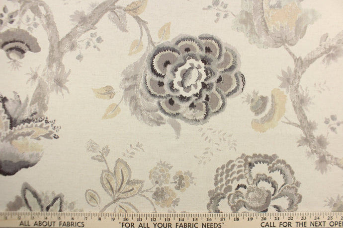 Winslow is a beautiful floral watercolor print in taupe and tan.  Use this multi purpose fabric for drapery, pillows, bedding, placemats, home decor and light upholstery.  It is soft and durable with 12,000 double rubs.