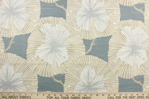 Mirabel features a large-scale floral design in taupe, white and gray on a blue gray background.  Use this multi purpose fabric for clothing as well as drapery, pillows, bedding, placemats and light upholstery.  The possibilities are endless.