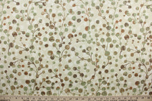 Load image into Gallery viewer, Orbits is a medium weight fabric that is printed on 100% cotton duck.  The beautiful color palette includes warm tones of cream, beige, brown, rust, and green.  It has a soft hand and good durability with 50,000 double rubs.  It can give any space a much needed update.  The versatile fabric is perfect for window accents (draperies, valances, curtains and swags) cornice boards, accent pillows, bedding, headboards, cushions, ottomans, slipcovers and upholstery.  
