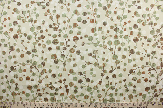 Orbits is a medium weight fabric that is printed on 100% cotton duck.  The beautiful color palette includes warm tones of cream, beige, brown, rust, and green.  It has a soft hand and good durability with 50,000 double rubs.  It can give any space a much needed update.  The versatile fabric is perfect for window accents (draperies, valances, curtains and swags) cornice boards, accent pillows, bedding, headboards, cushions, ottomans, slipcovers and upholstery.  