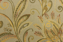 Load image into Gallery viewer, This tapestry features a floral design in gold, golden tan, and green against a dull green.
