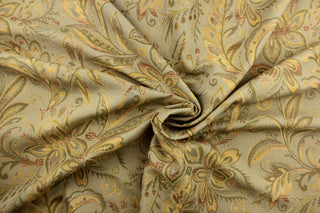 This tapestry features a floral design in gold, golden tan, and green against a dull green.