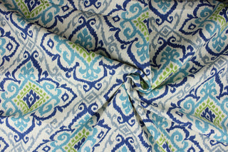  Chevelle is a multi use fabric featuring a medallion design in teal, navy blue, grey and green against an ivory background.  The versatile fabric is perfect for window accents (draperies, valances, curtains and swags) cornice boards, accent pillows, bedding, headboards, cushions, ottomans, slipcovers and upholstery.  It has a soft workable feel yet is stable and durable with 20,000 double rubs.  