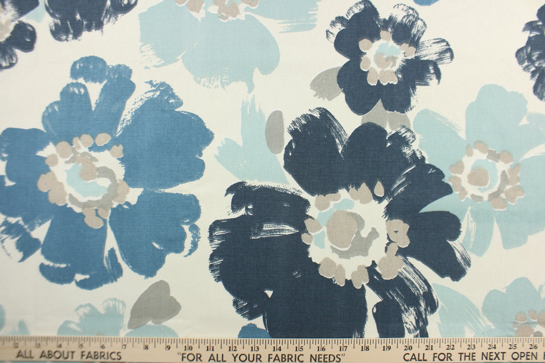 This fabric features a floral design in varying shades of blue and gray against a dull white background . 