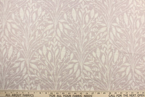 This fabric features a leaf design in a pale purple and dull white.