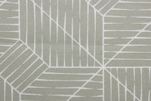 Load image into Gallery viewer, Planx blends geometric shapes with a timelessly elegant white and platinum color palette.  Boasting a durability of 50,000 double rubs, this fabric is a dependable and stylish choice for any home.  It can be used for several different statement projects including window accents (drapery, curtains and swags), decorative pillows, hand bags, bed skirts, duvet covers, upholstery and craft projects.  
