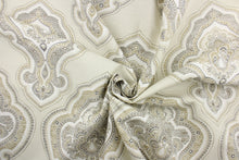 Load image into Gallery viewer,  This fabric features a paisley demask design in white, gray, beige, brown and off white 
