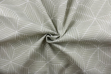 Load image into Gallery viewer, Planx blends geometric shapes with a timelessly elegant white and platinum color palette.  Boasting a durability of 50,000 double rubs, this fabric is a dependable and stylish choice for any home.  It can be used for several different statement projects including window accents (drapery, curtains and swags), decorative pillows, hand bags, bed skirts, duvet covers, upholstery and craft projects.  
