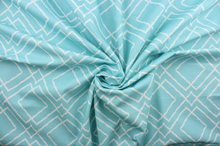  Jacava is a multi use fabric featuring a geometrical design in blue and white.  It can be used for several different statement projects including window accents (drapery, curtains and swags), decorative pillows, hand bags, bed skirts, duvet covers, upholstery and craft projects.  It has a soft workable feel yet is stable and has a durability rating of 15,000 double rubs.