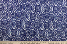 Load image into Gallery viewer, This fabric features a sand dollar design in rich indigo blue . 
