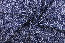 Load image into Gallery viewer, This fabric features a sand dollar design in rich indigo blue . 
