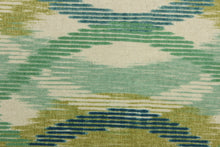 Load image into Gallery viewer, This fabric features a geometric design blue, turquoise, teal, lime green and seafoam against a natural background.
