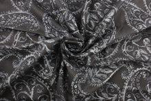 Load image into Gallery viewer, This fabric features a leaf design in gray and black against a dark charcoal gray. 
