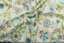 Load image into Gallery viewer, Daphne is a luxurious linen-rayon blend fabric with a floral design featuring shades of blue, brown, cream, and olive green, on an off-white background. This ultra-soft material is perfect for adding texture and visual interest to any décor. The versatile fabric is perfect for window accents (draperies, valances, curtains and swags) cornice boards, accent pillows, bedding, headboards, cushions, ottomans, slipcovers and light duty upholstery. 
